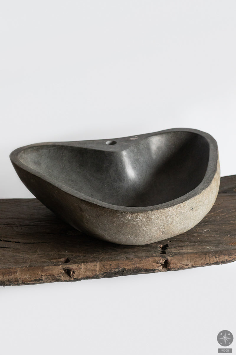 Lava stone washbasin with a hole for a faucet