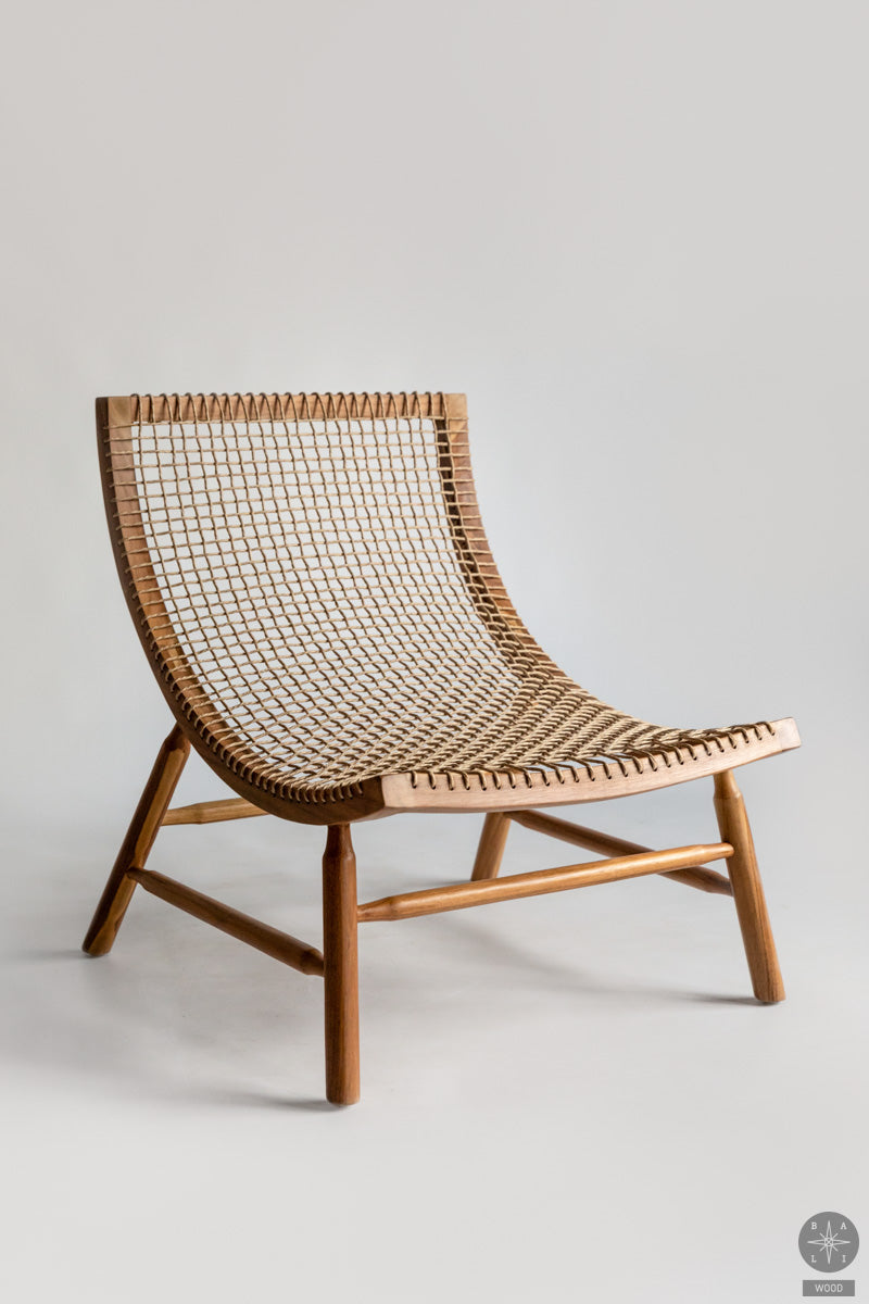 Armchair made of synthetic rattan and teakwood