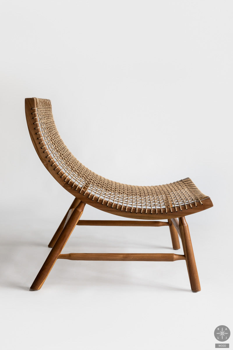 Armchair made of synthetic rattan and teakwood