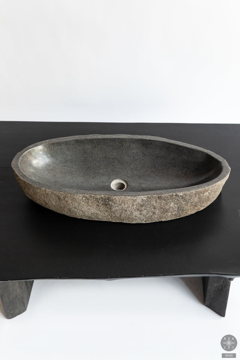 River stone sink