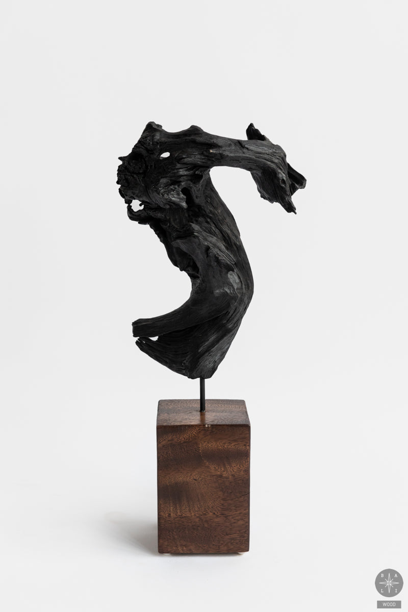 Teak wood decoration on a stand