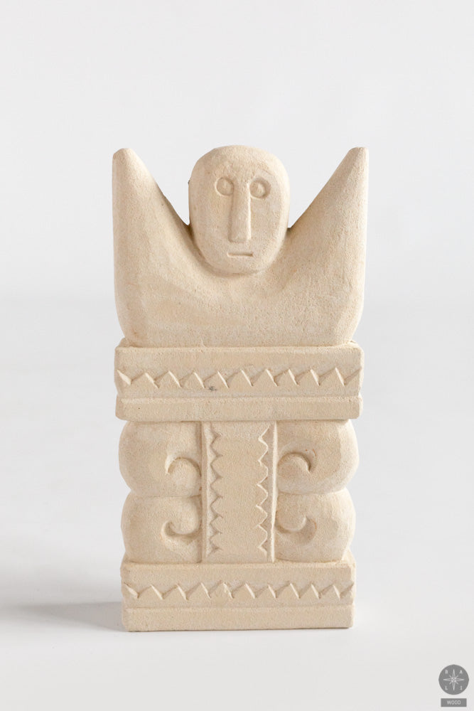 Primitive art statue