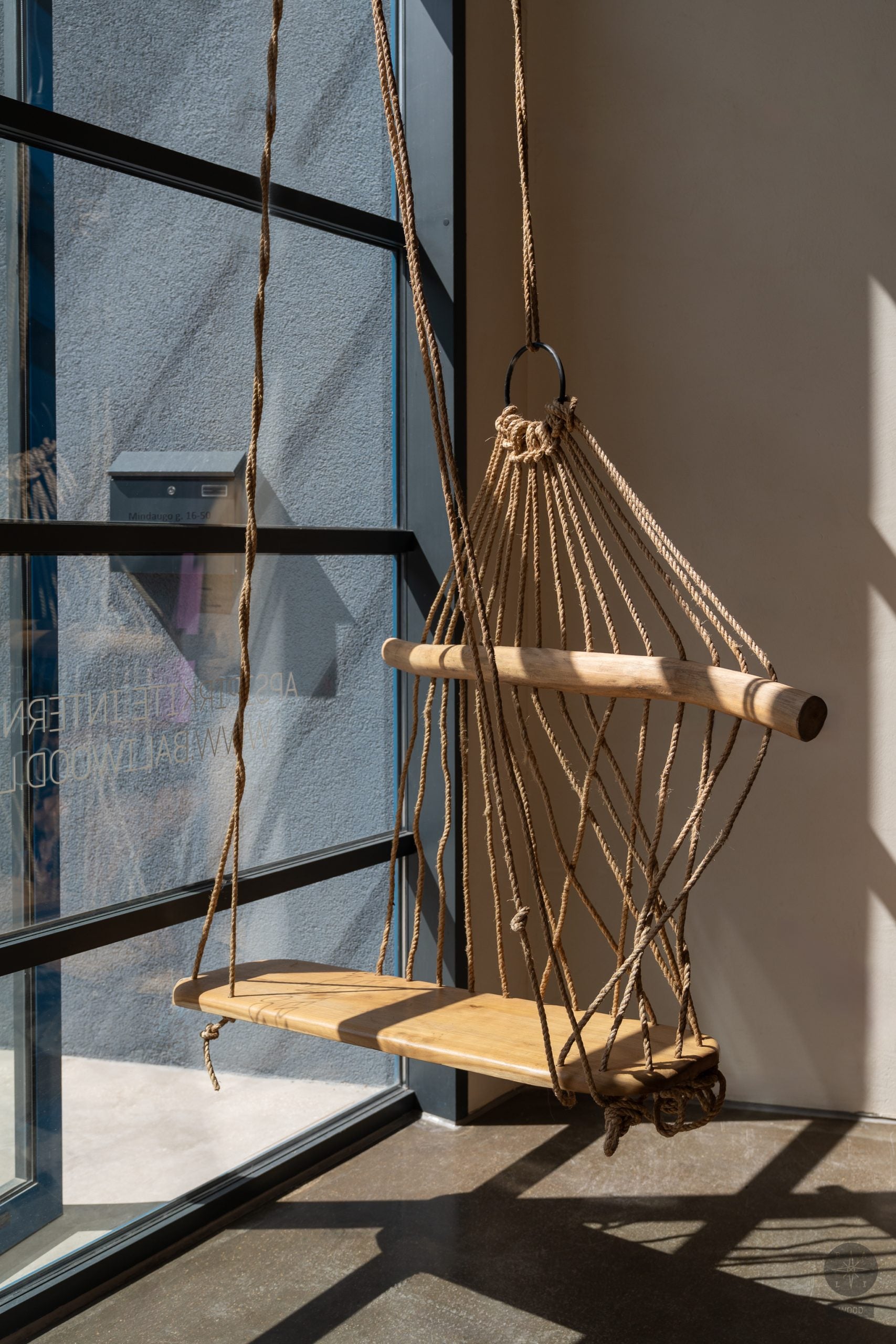 Hanging swing made of teak wood