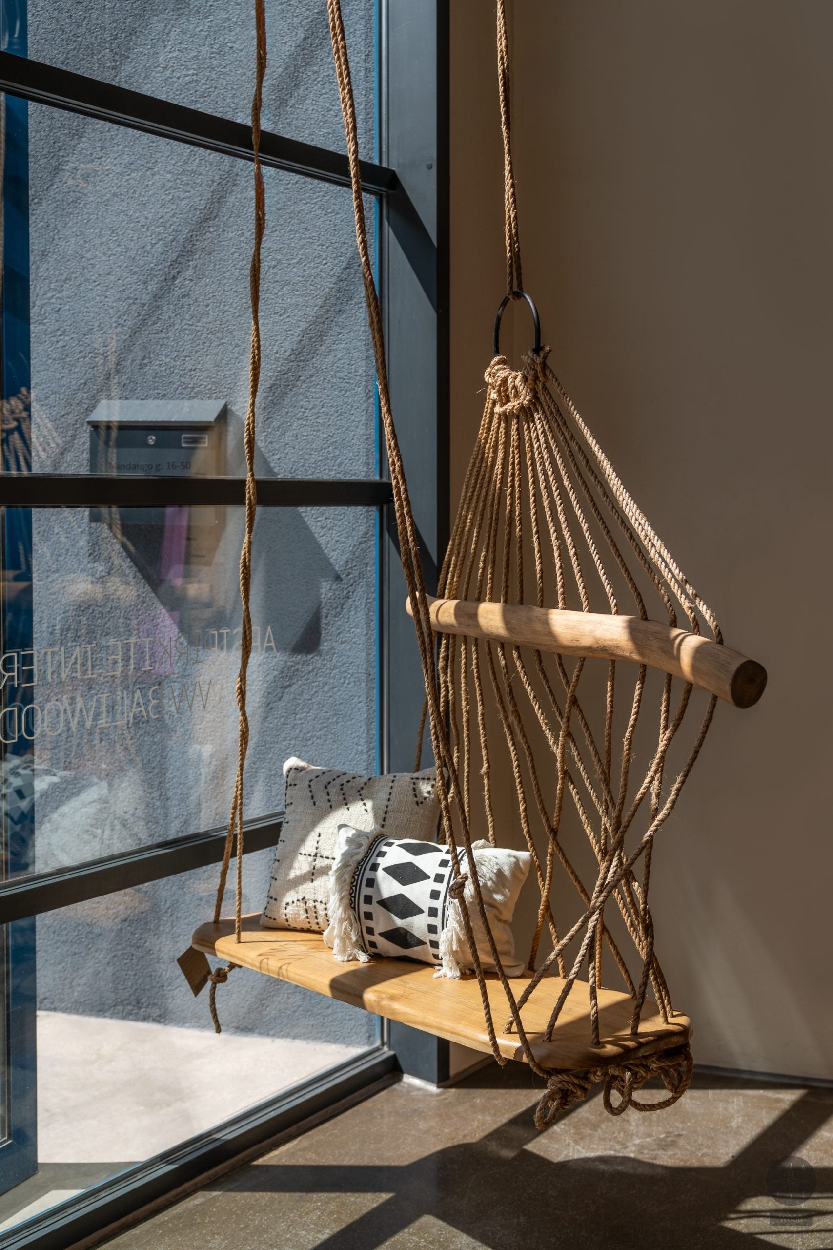 Hanging swing made of teak wood