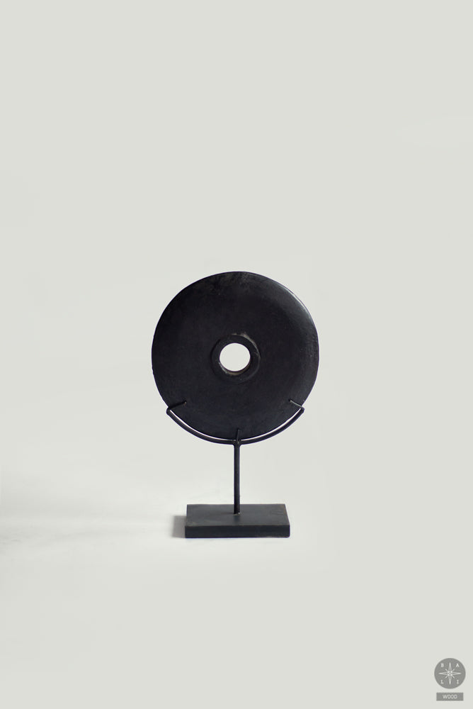 Stone decoration on a metal stand