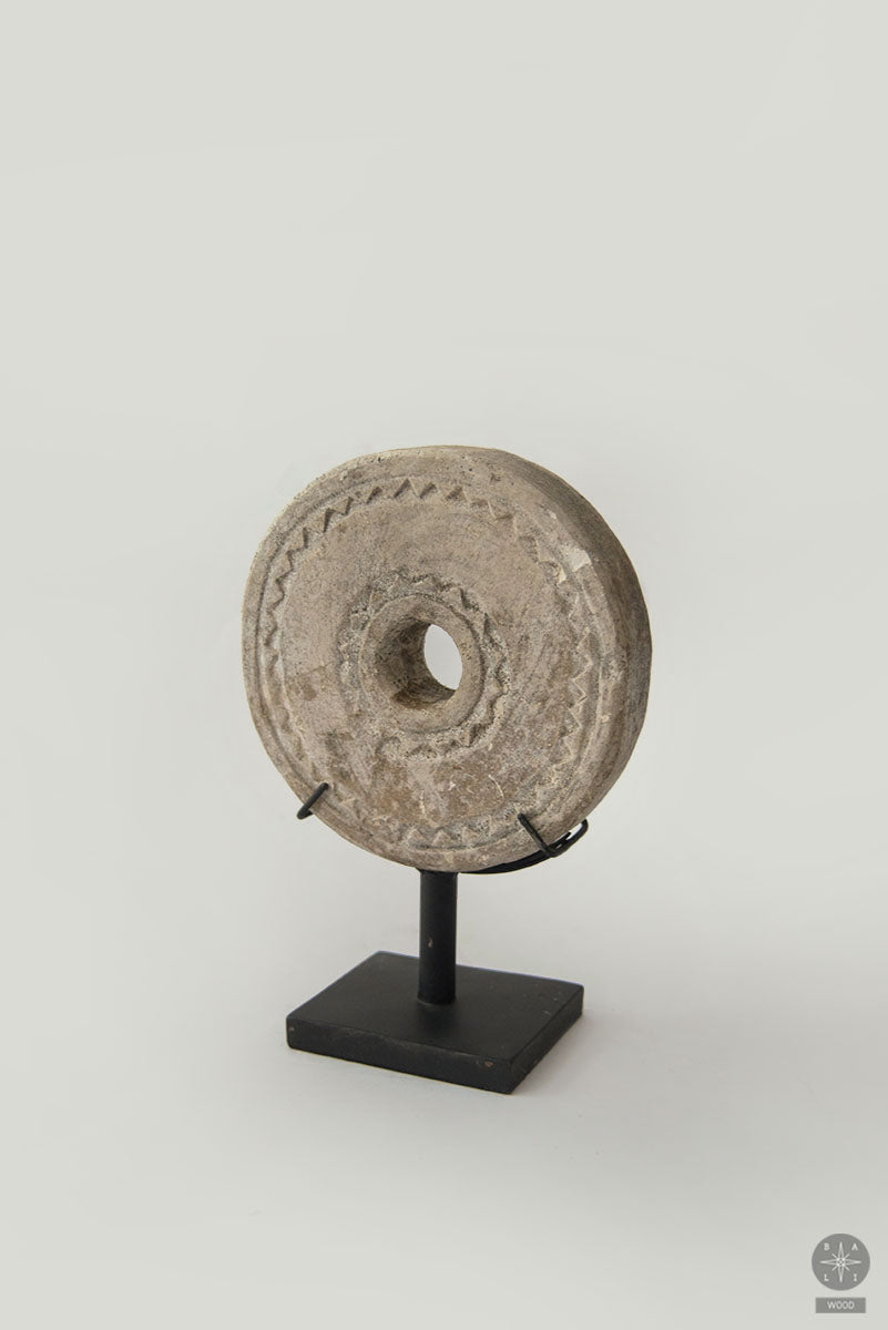 Stone decoration on a metal stand