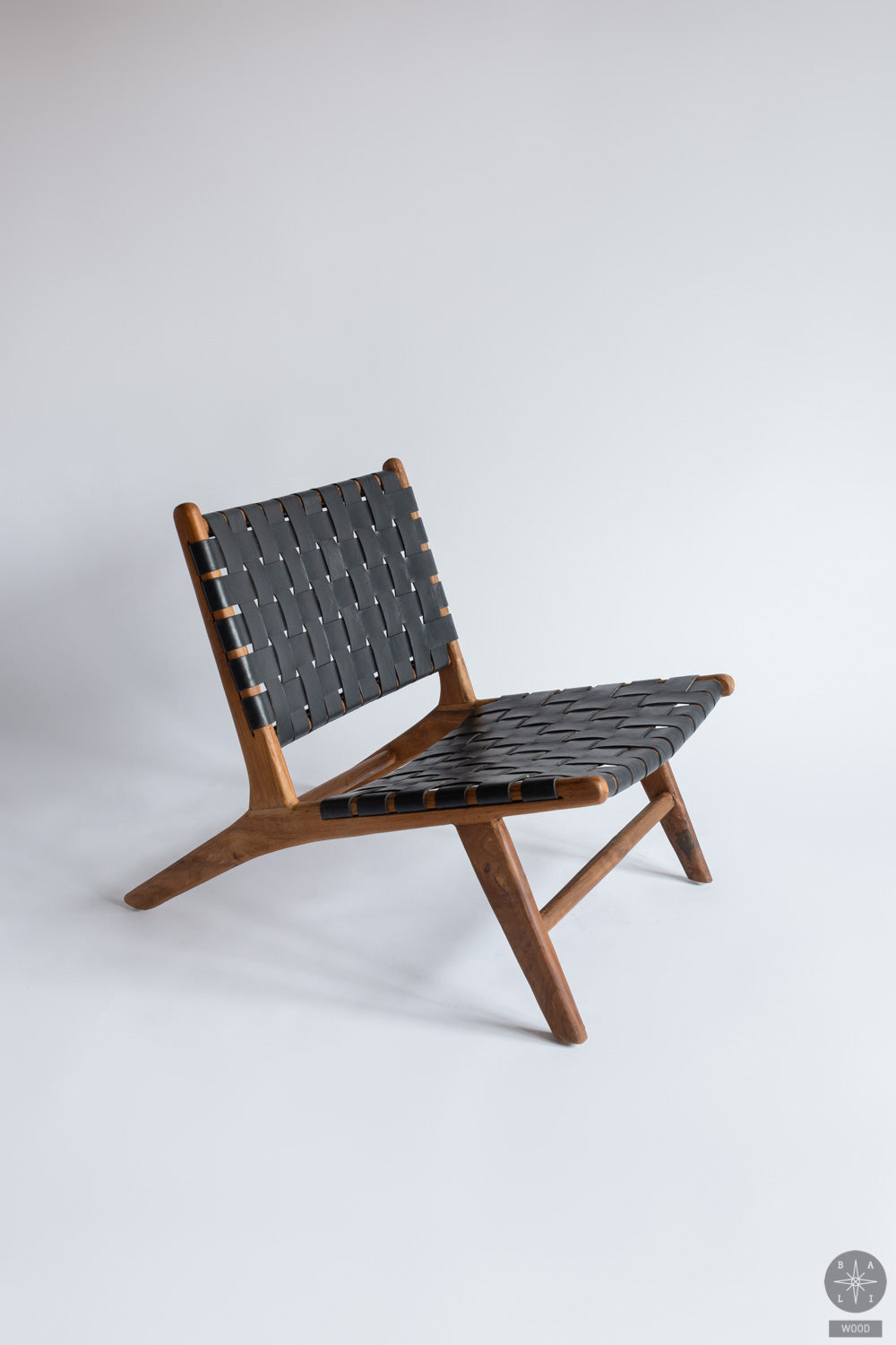 Teakwood low chair with leather
