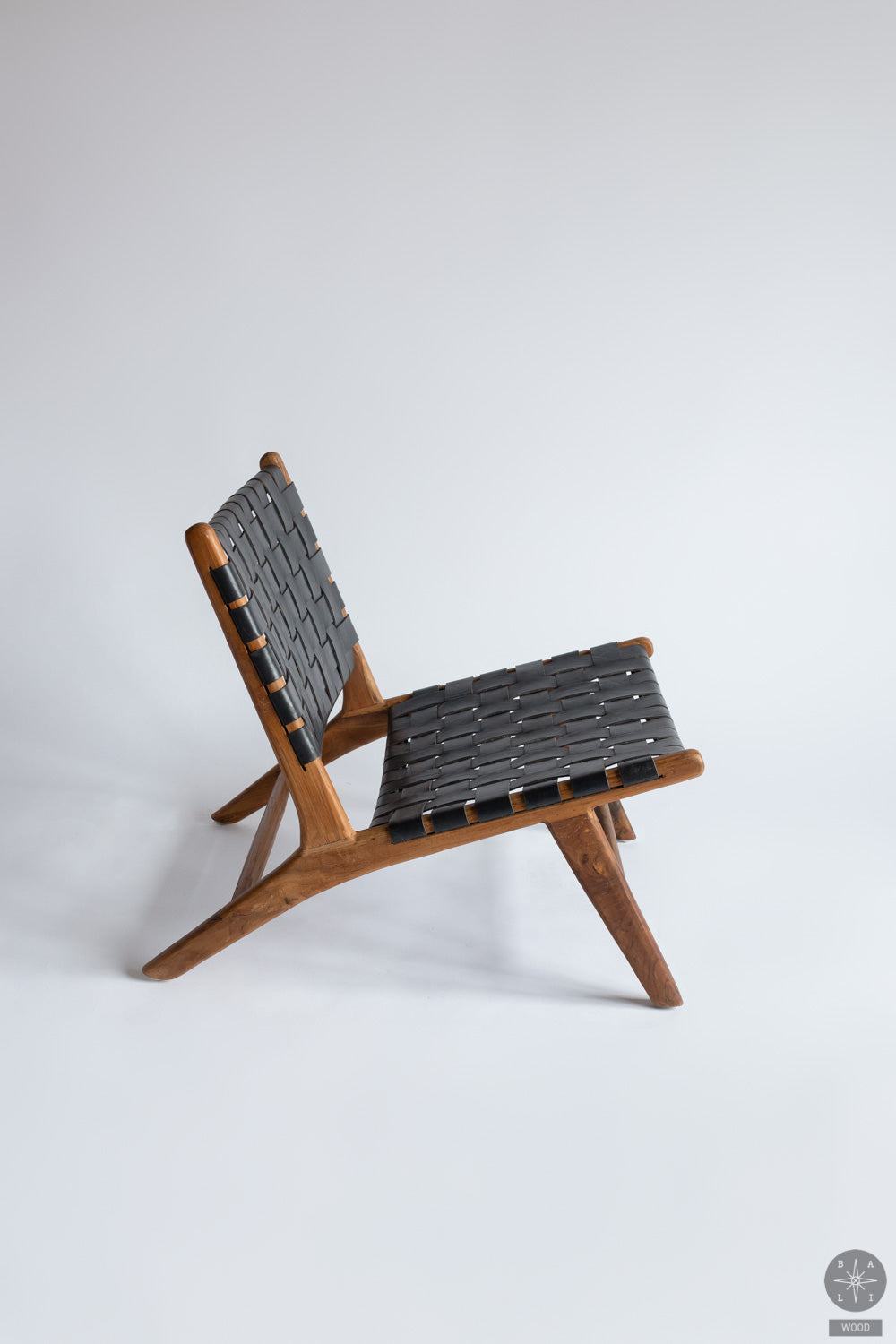 Teakwood low chair with leather