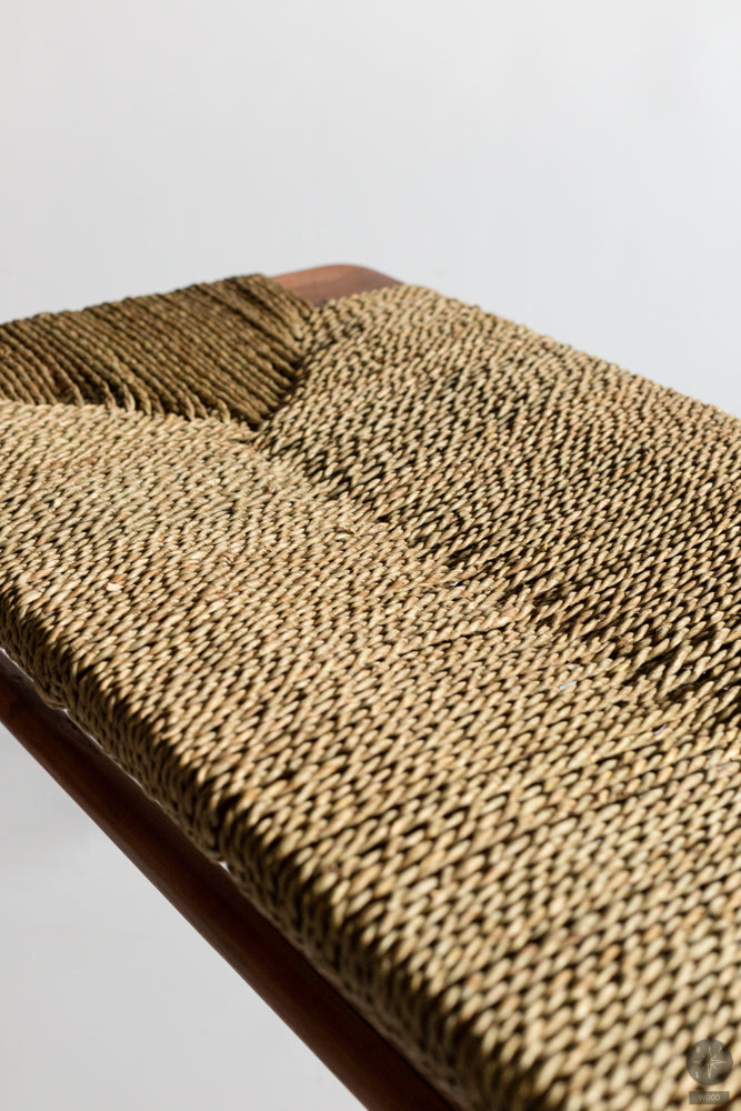 Bench made of teak and natural seagrass