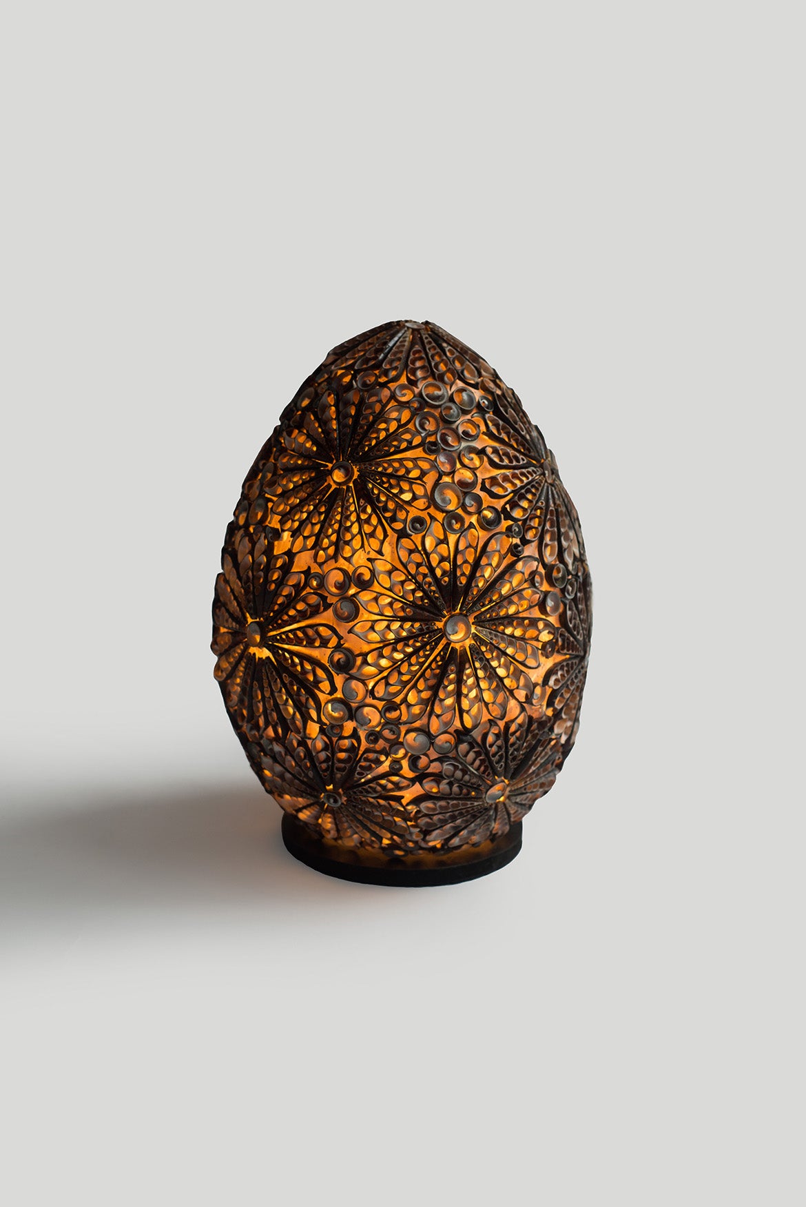 Table lamp made of dark shells