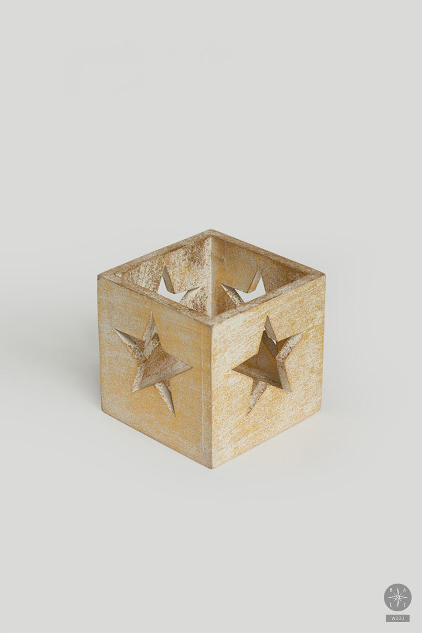 Golden candlestick made of wood