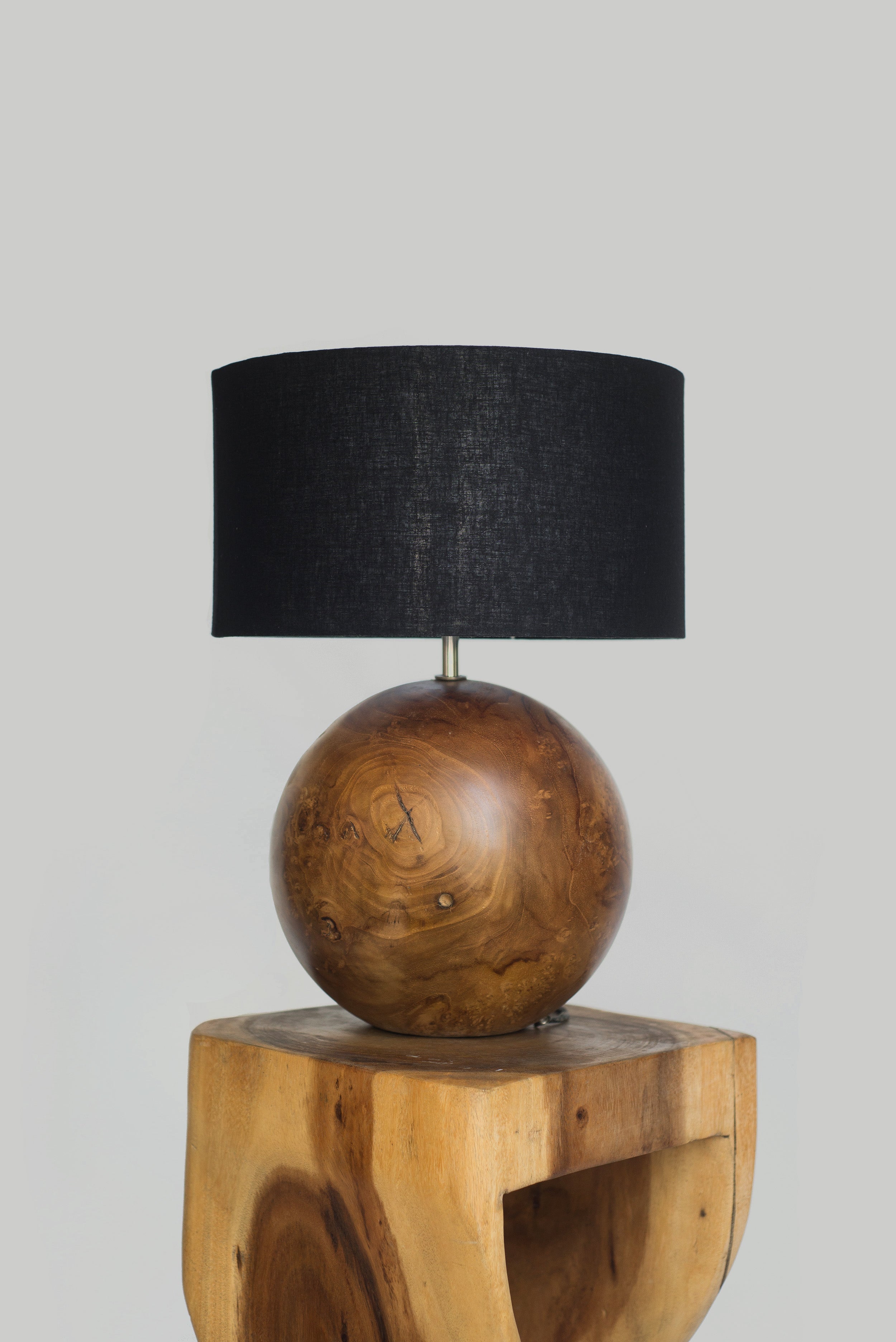 Round table lamp made of solid wood