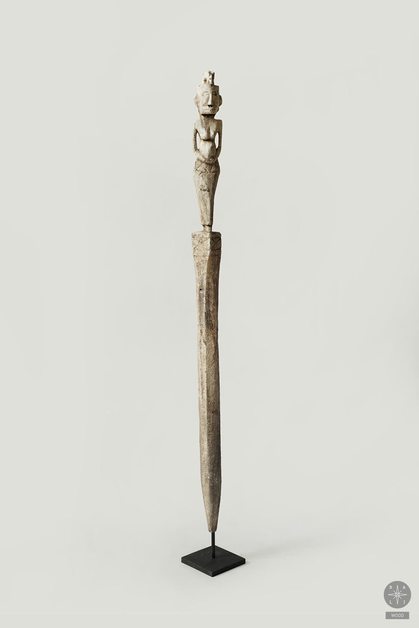 Statue made of white washed teak wood