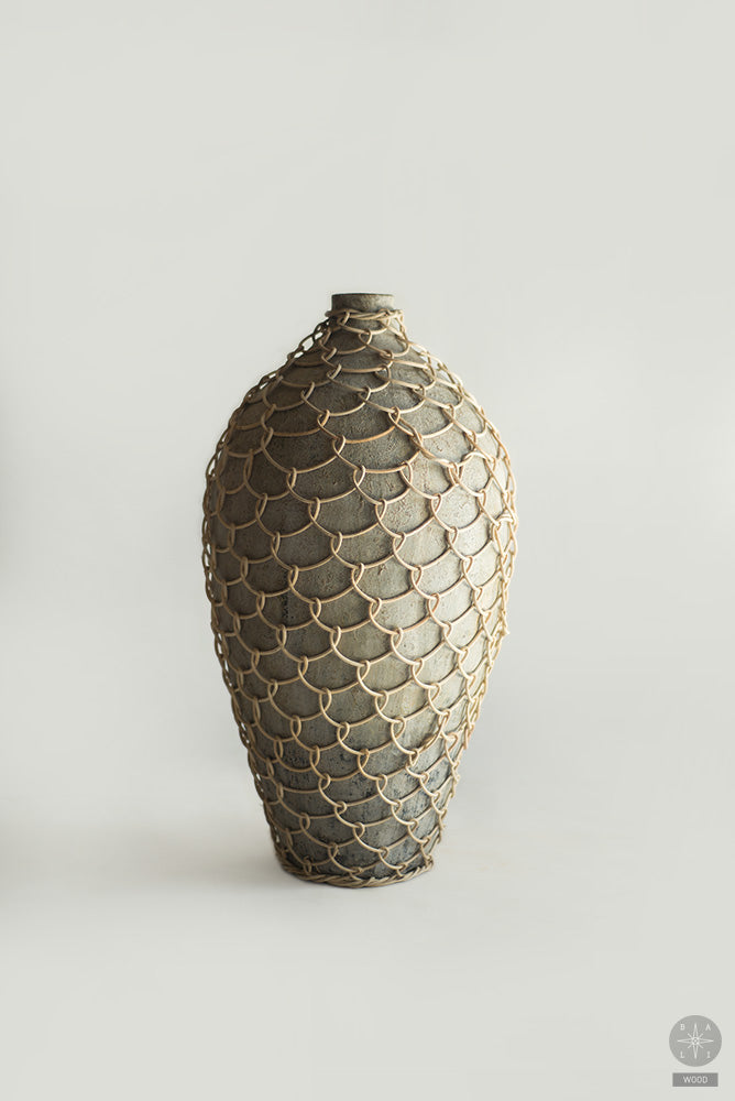 Vase wrapped in rattan