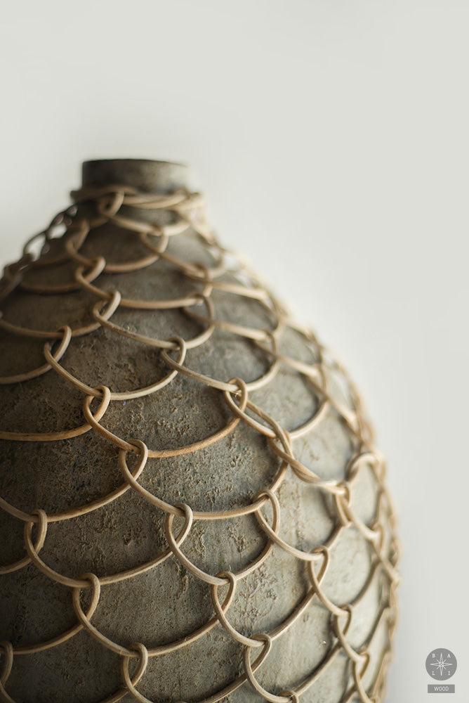 Vase wrapped in rattan